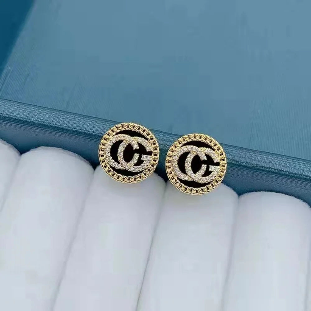 Zircon-studded letter earrings