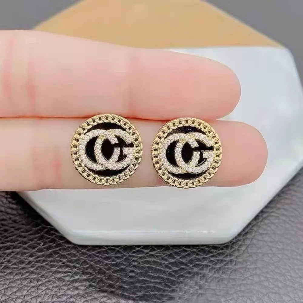 Zircon-studded letter earrings