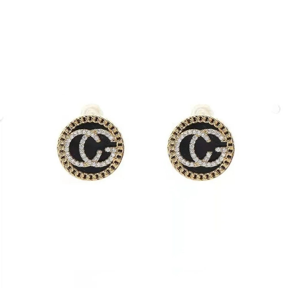 Zircon-studded letter earrings