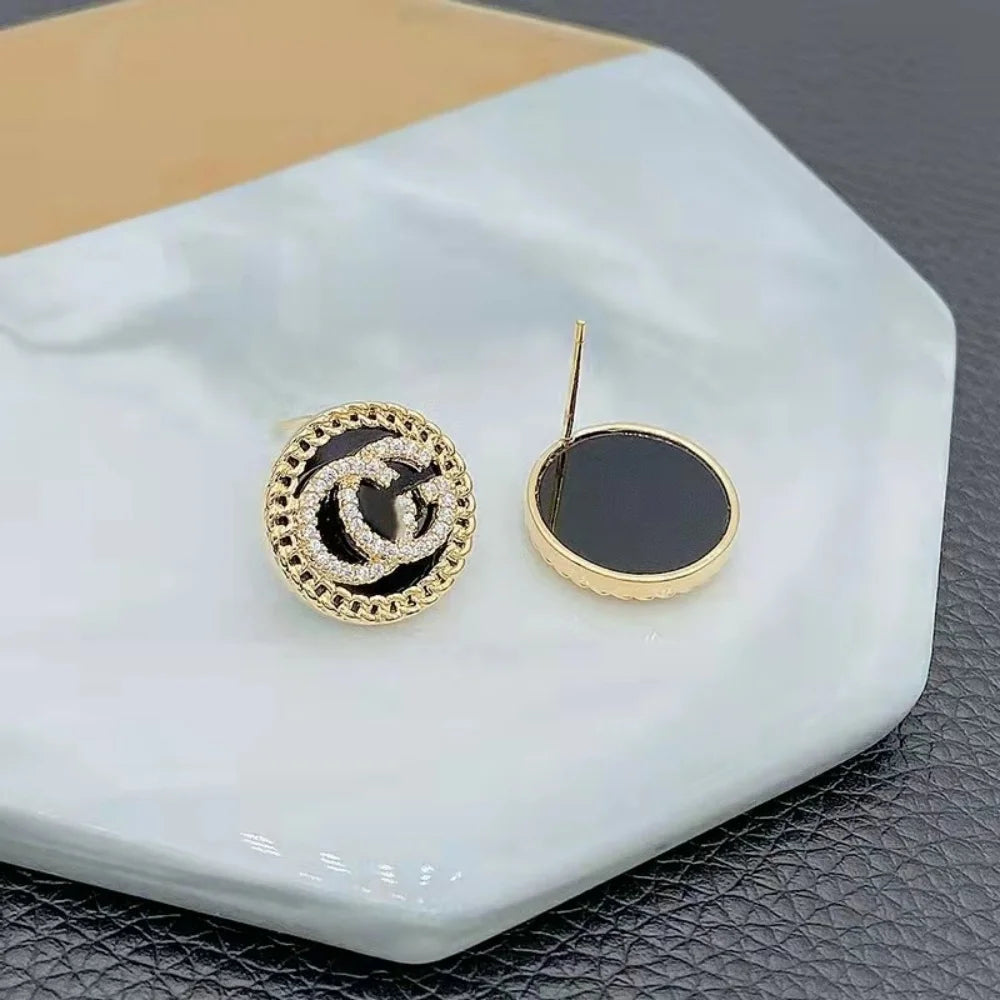 Zircon-studded letter earrings